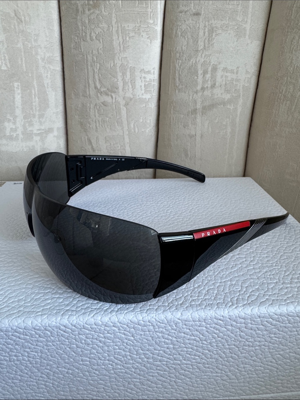 Prada Black Shield Sunglasses with Red Temple Accent